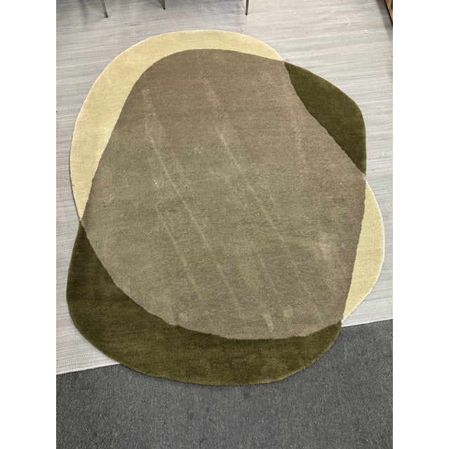Design Plus Gallery presents the 5ft 3in x 6ft 8in Element Moore Moss Rug from Brink & Campman. The rug has unique, soft-...
