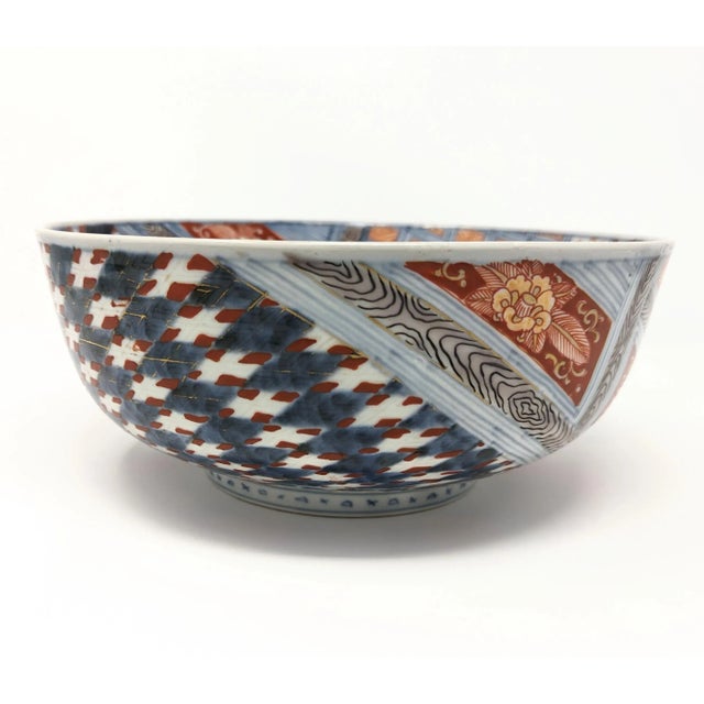 Exquisite antique handcrafted Japanese (or possibly Chinese) imari porcelain bowl with intricate designs hand painted on...