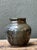 This vintage glazed stoneware vase is a refined example of mid-century studio pottery, distinguished by its balanced...