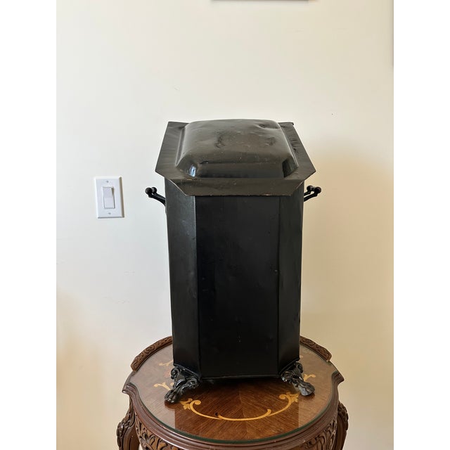 Early 20th century farmhouse black tin fireplace coal scuttle/ hearth-ware bucket/bin. Rectangular form with slanted lid....