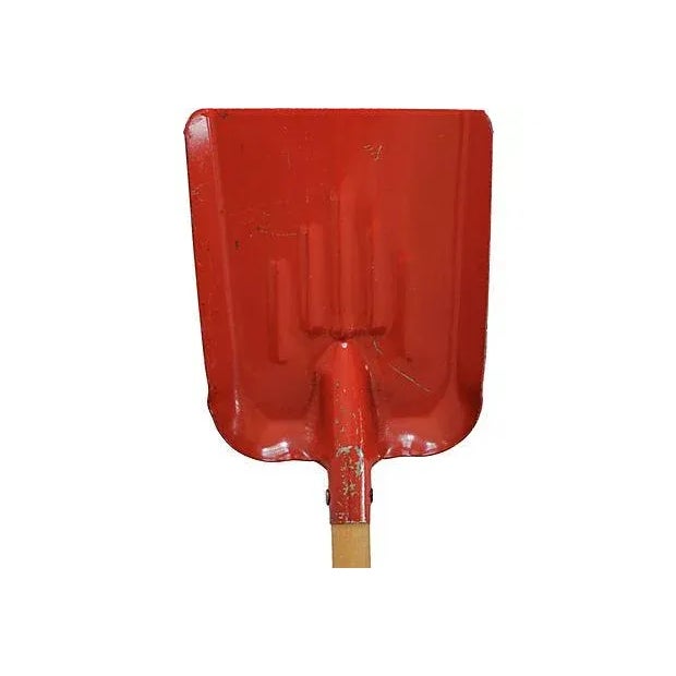 Circa 1950s wood and metal child's shovel, new old store stock found in western Pennsylvania. Slight scratches from age.