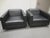 The Bernhardt Design Lounge Chairs in black offer a sleek, contemporary look with a focus on comfort and clean lines. This...