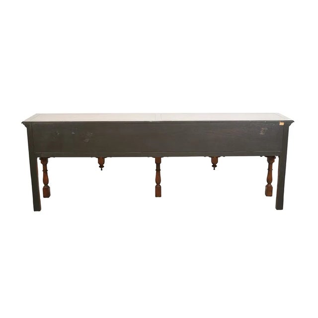 This is a superb quality very heavy 100 inches long Antique Style Welsh Dresser Base by Baker Furniture is a unique and...