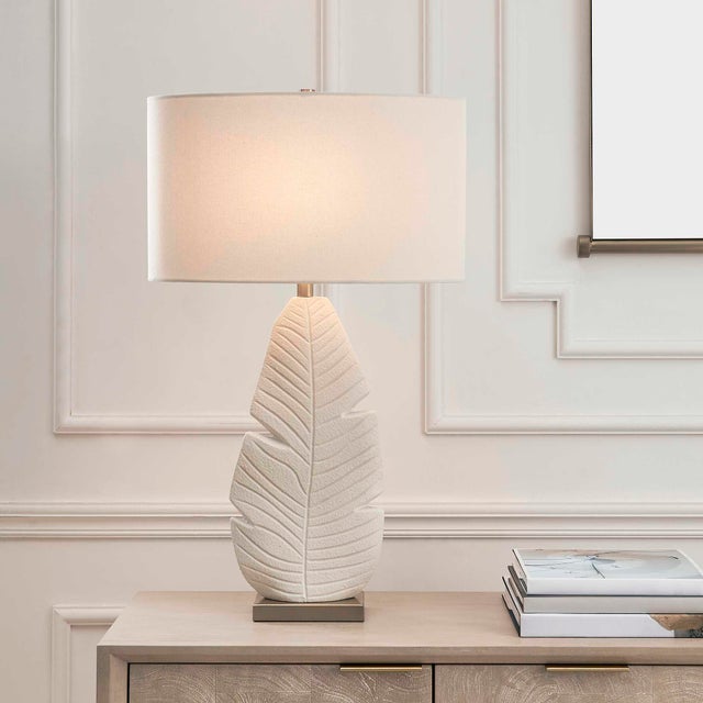 The Palm Leaf Table Lamp Features An Intricately Textured Ceramic Leaf Motif Finished In A Warm Matte White Glaze,...