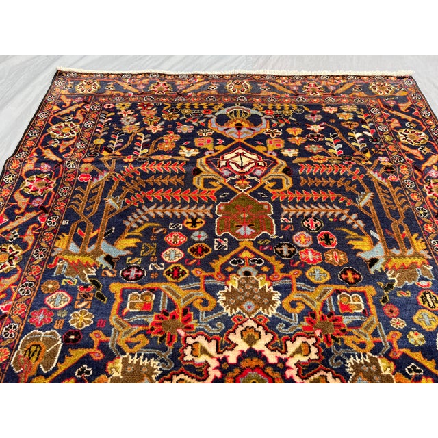 Islamic Vintage Afghan Baluchi Hand-Knotted Rug With Floral Medallion Design in Navy Rug For Sale - Image 3 of 11