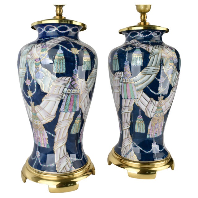 A stylish pair of vintage Chinese porcelain table lamps, dating from the 1980s. Finished in a deep dark blue glaze with...