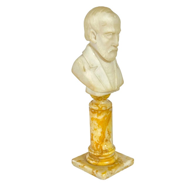 Grand Tour marble bust of French philosopher on marble stand. The bust has been glued to the stand this piece is a marriage.