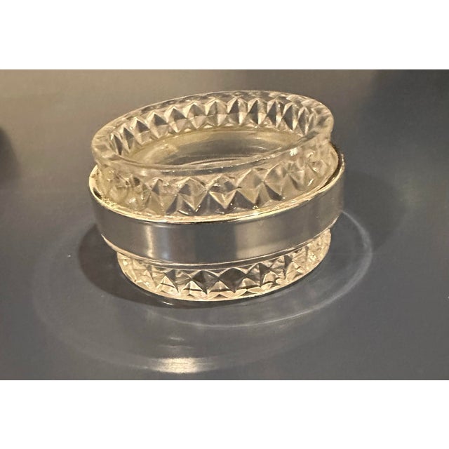 Vintage set of Oneida Lead Crystal Silver Band Napkin Rings. A couple still have the original sticker.