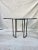 This is a McGuire round glass table from the Thomas Pheasant collection of outdoor furniture. The heavy metal base is...