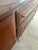 Rosewood veneer credenza with figural nude relief panels atop marble base. Mid century Italian. No makers mark.