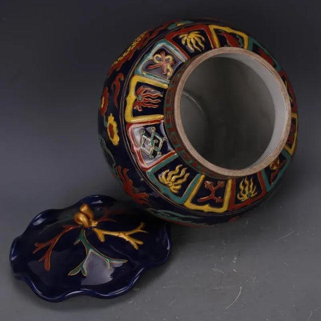 H-29.6cm,W-24cmThe Blue Ground Famille Verte Porcelain Lid Jar is a hand-painted ceramic piece with a striking cloud...