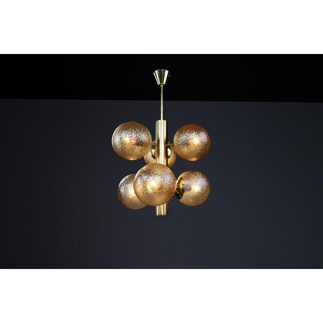 Patinated brass sputnik chandelier with six gold-colored globes, germany 1960s this mid-century sputnik chandelier...