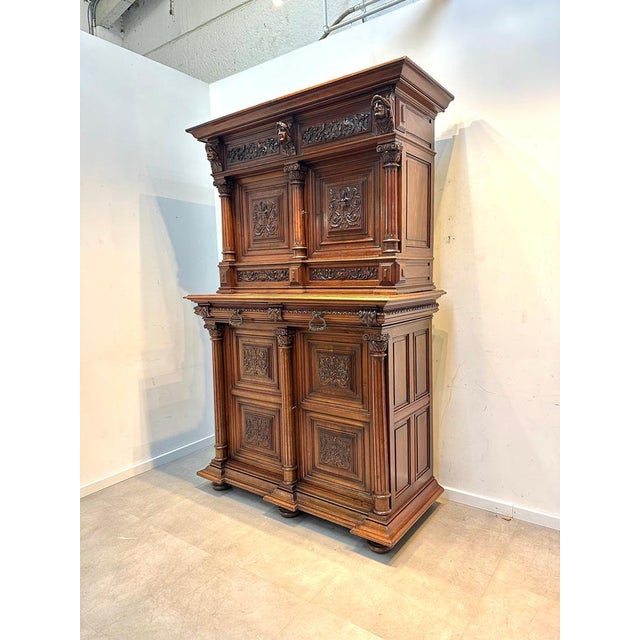 Magnificent late 19th-century Renaissance Revival buffet cabinet in richly carved walnut. This impressive piece features...