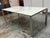 Design Plus Gallery presents the Rand Ceramic Top Dining Table from Room & Board. The table pairs a white ceramic surface...