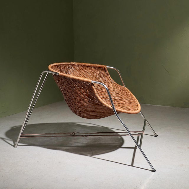 The coqueta chair was designed by pete sans for bd barcelona in the late 1980s. First introduced around 1987–1988, it...