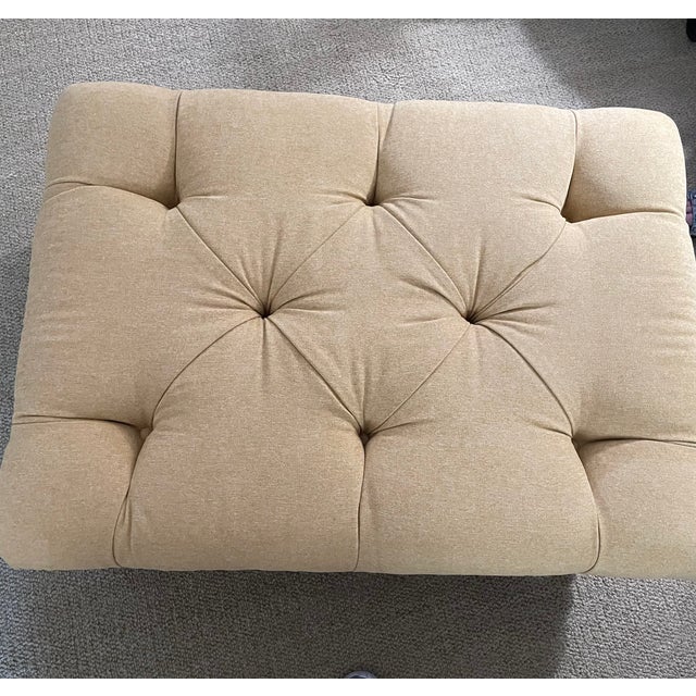 Gold fabric, diamond tufted ottoman with double row brass nailheads. Original ottoman had single row of nailheads. This...