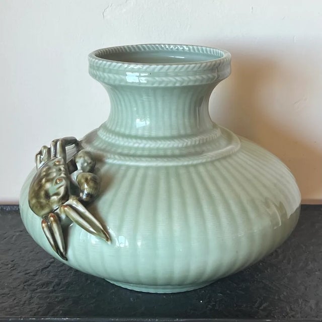 Antique Japanese Ribbed Porcelain Vase in Celadon Glaze with Braided detail and Crab Fishne Measures approx: 13D x 10.5H...
