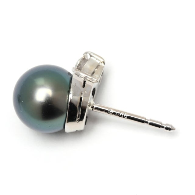 Stones: tahitian pearl, 2 round bead 8.9 mm diamond, 2 round brilliant cut 3.5 mm .35 ctw FG color/ VS2-SI1 clarity...