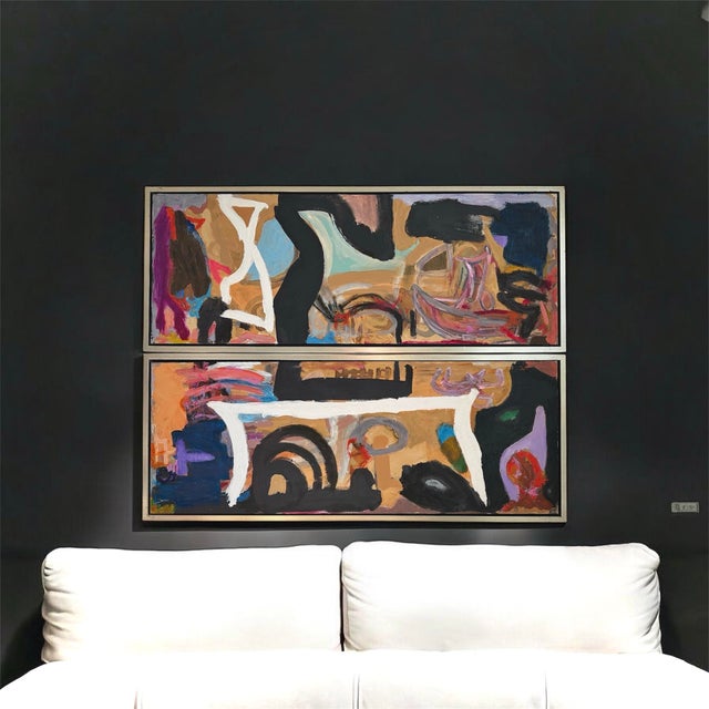 A whimsical and color bound abstract diptych painting performed on canvas and housed attractively within vintage silver...