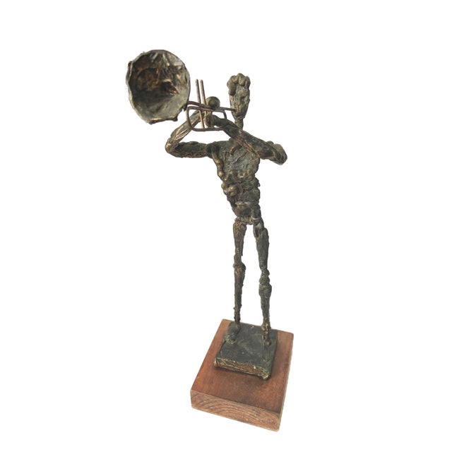 This captivating brutalist mid-century find brings the energy of a jazz solo into three dimensions. Sculpted from wiry...