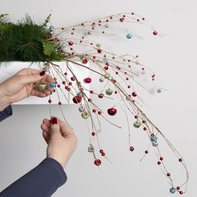 Bring festive cheer to your holiday decor with this elegant Jingle Bell Spray! Standing at 42 inches tall, these sprays...