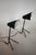 Pair of Swedish tripod lamps produced during the 1950s. Executed in black enamelled metal with brass details. The...