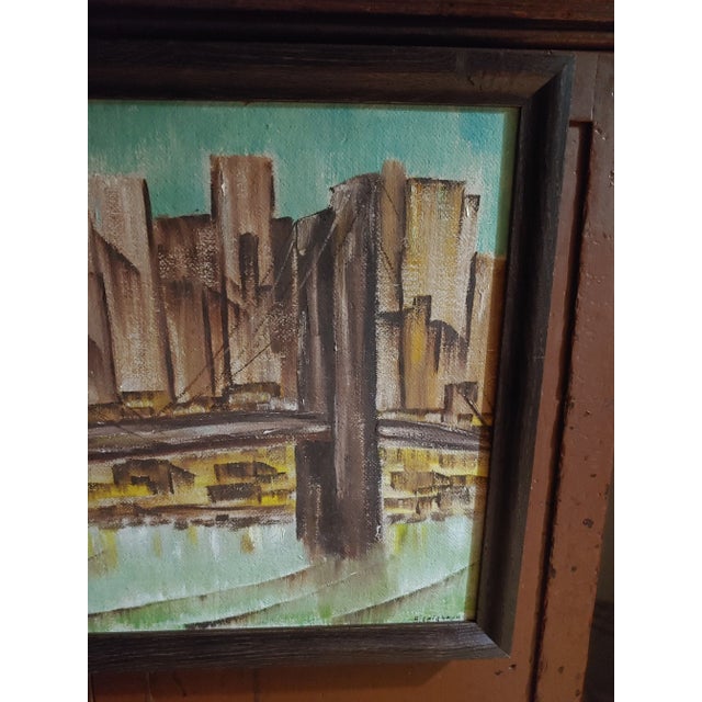 Here's a Mid-20th Century oil on board that has been recently framed in a nice dark hardwood frame. The cityscape is...