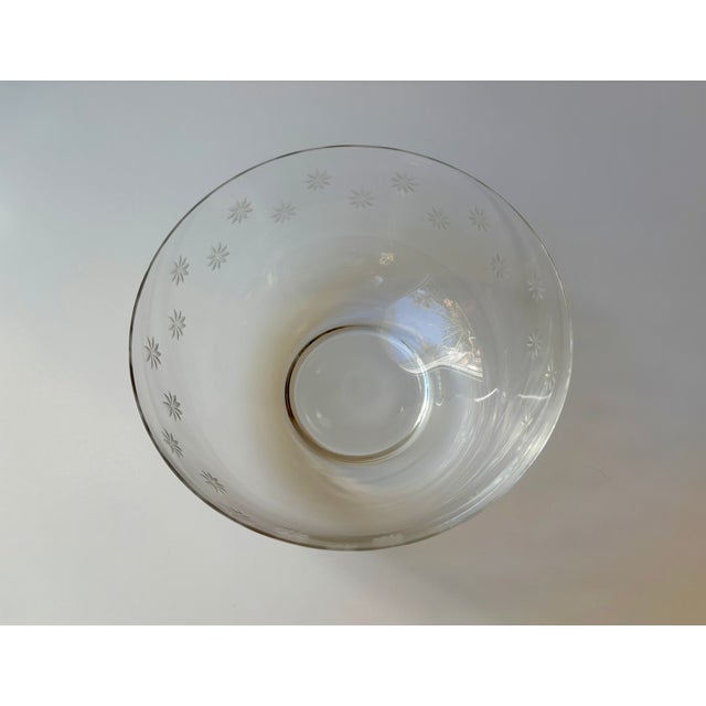 This blown glass 6” crystal bowl made by Tiffany & Co. features the discontinued Daisy design.
