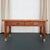 This industrial maple library console table was designed by the John E. Sjöström Company of Philadelphia. The company...