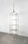 Spectacular Mid-Century Tension Pole ceiling-to-floor shelving design in brass from the 1960s, a truly unusual and...