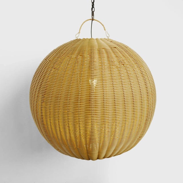 Outdoor faux rattan small globe lantern. Beautifully woven synthetic rattan with a natural wicker appearance. Rust-...