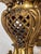 A luxurious Art Nouveau chandelier featuring prominent floral ornamentation and flower-shaped shades. The body of the...