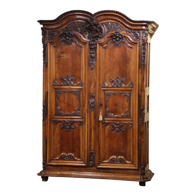 18th Century French Louis XV Carved Walnut Armoire From Lyon For Sale