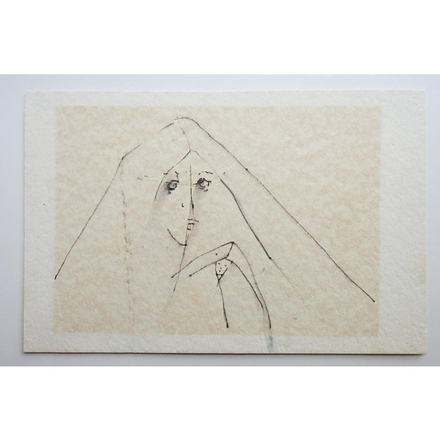 Small mid 20th century pen and ink on tan paper modernist drawing of mother and child. Unsigned. Unframed, age toning.
