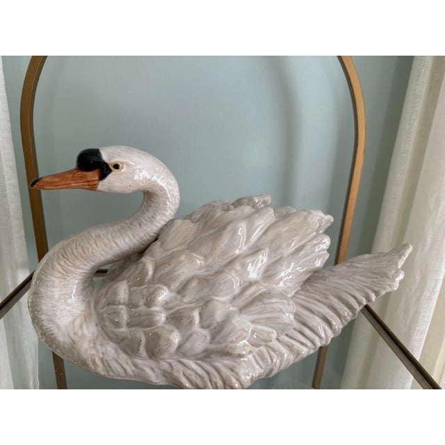 A striking and substantial ceramic swan, this would make a fabulous and interesting addition to any decor style. Unknown...