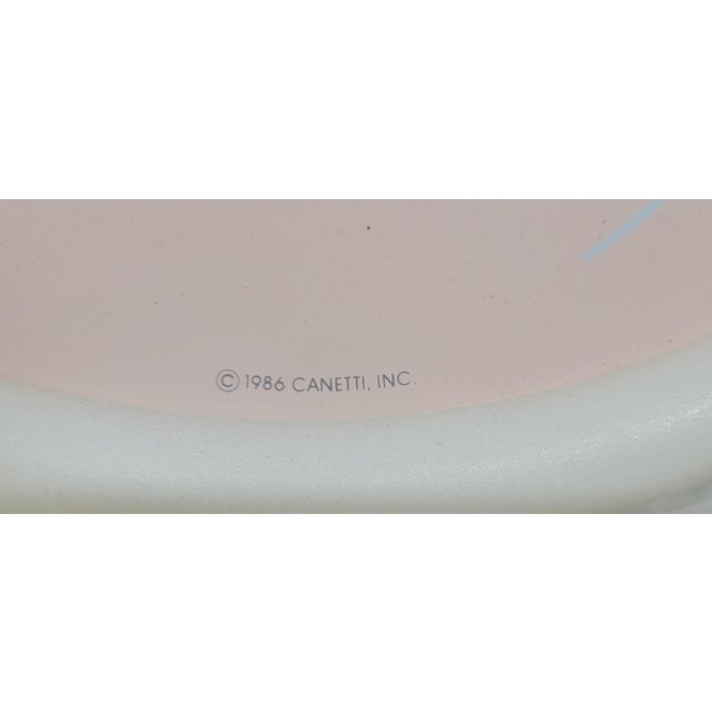 Rare Postmodern Wall Clock by Nicolai Canetti. His geometric shapes and funky color combinations are iconic...