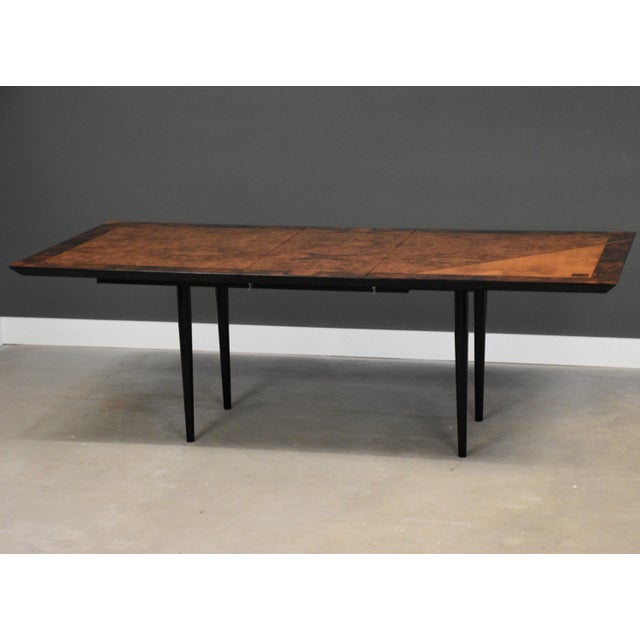 A mid century modern maple burl and carpathium burl dining table designed by Dell'Arredamento for Miniforms . Circa...