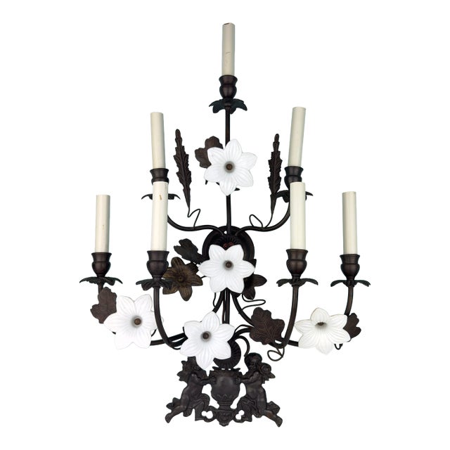 Vintage 7 Light Wrought Iron Wall Sconce With Milk Glass Flowers & Cherub Motif Matching Sconce Available Separately For Sale