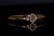 Authentic Chopard Happy Hearts bangle beautifully handcrafted in solid 18K rose gold. This iconic design pairs an...