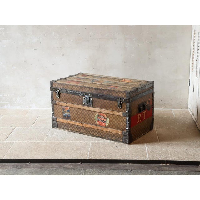 Antique Louis Vuitton steamer trunk finished in the classic Damier canvas (checkerboard pattern) in beige and brown. This...