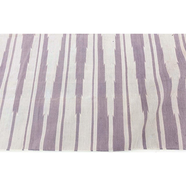 Vintage Indian Dhurrie Rug Size: 8'5" × 10'0" (256 × 304 cm) This striking vintage Indian Dhurrie rug presents a bold yet...
