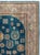 A vintage Chinese carpet with a Khotan design from the second quarter of the 20th century. Measures: 9' 0" x 11' 8"