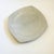 A large vintage hand made studio pottery tray. Rounded square shape with a textured abstract design in the center. Slab...