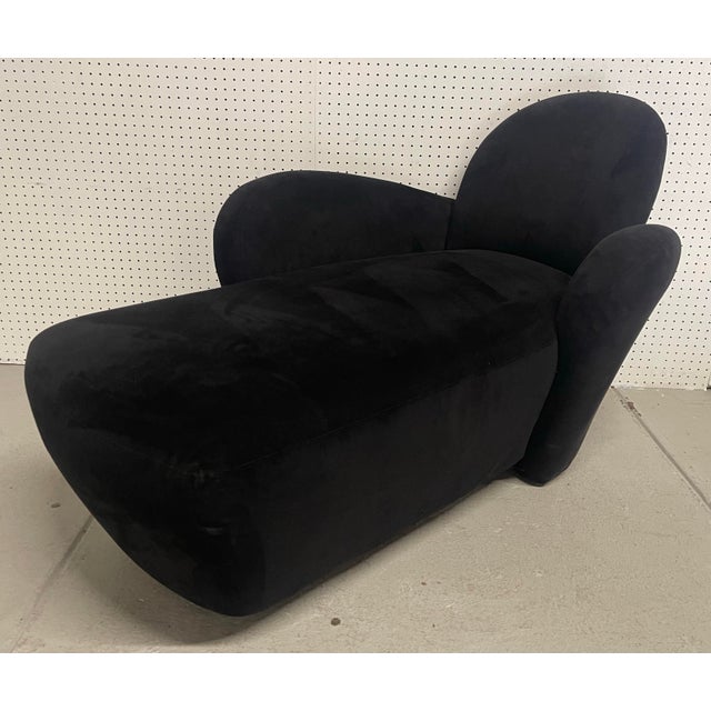 Elegant, comfortable and versatile, this chaise lounge speaks style and luxury. Upholstered in dramatic and elegant black...
