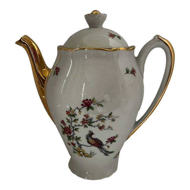 Vintage Limoges Gold Handled Porcelain Teapot With Lid Adorned With Flower Vines and Beautiful Peacock For Sale