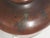 Rich coppery bronze vase with the style of Swedish Modern and a tribal series of pictograph imagery. A beautiful vase with...