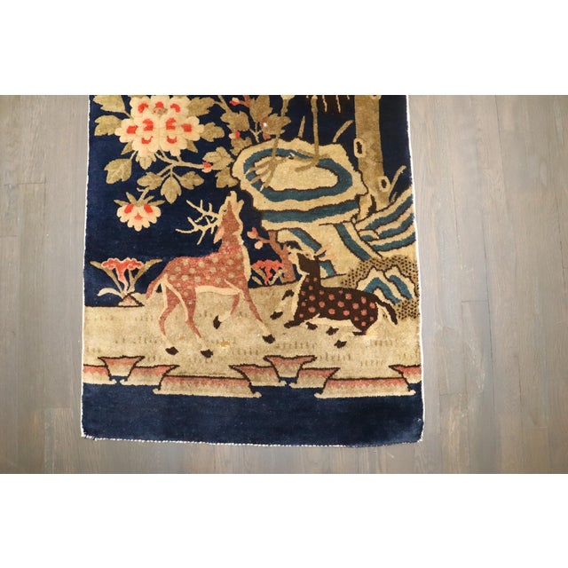 An early 20th-century Peking Chinese Pictorial Rug Details rug no. j4233 size 2' 3" x 4' 5" (69 x 135 cm)