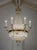 Elegant hot air balloon chandelier in bronze and cut crystal, made in Italy in the 1930s. The structure is composed of a...