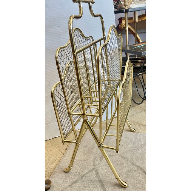 Just in this Rare late 19th century to early 20th century, exceptional solid Brass Neoclassical Magazine Rack, by Maison...
