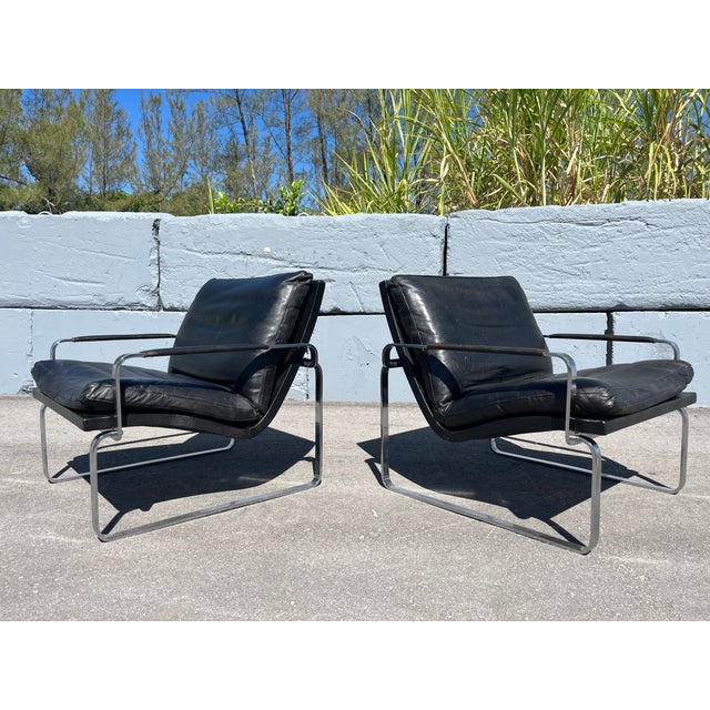 Jørgen Lund and Ole Larsen for Bo-Ex, pair of lounge chairs, model 'BO 911', black leather, chrome-plated steel, Made in...